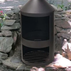 Idooka Black Chiminea Outdoor Heating Fire Pit 12 Idooka Black Chiminea Outdoor Heating Fire Pit -Green Haven Shop Stone20Wall1